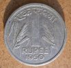 512px-Indian_one_Rupee_coin_(YS)