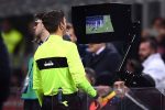 Referee-Gianluca-Rocchi-looks-at-the-scr